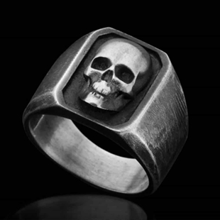 Herrenring mit Totenkopfgesicht aus Oxy-Stahl.