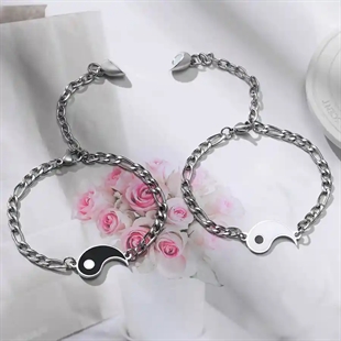 Yin und Yang Partnerarmbänder aus Edelstahl.